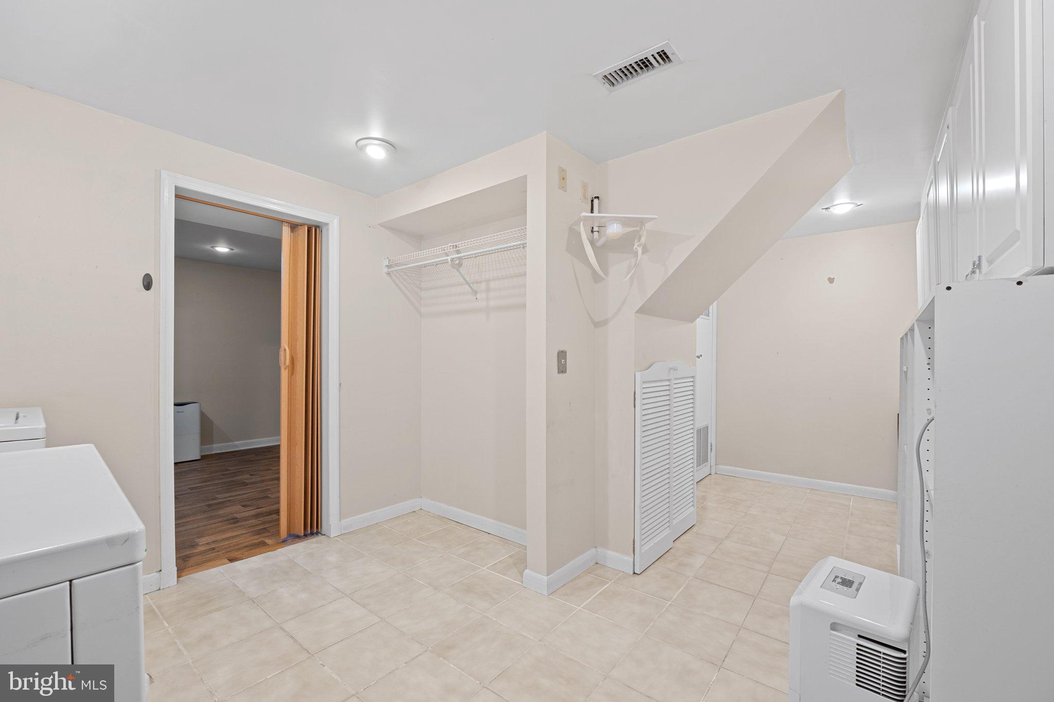 144 Cedarmere Road Owings Mills, MD 21117 - Photo 21 of 32 Basement/Laundry area