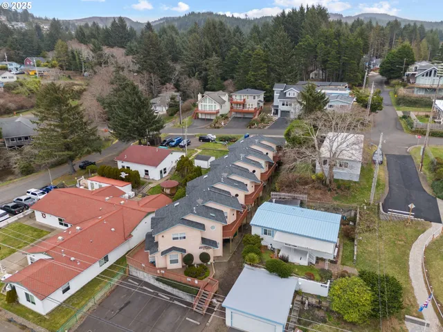 an aerial view of a house with a garden