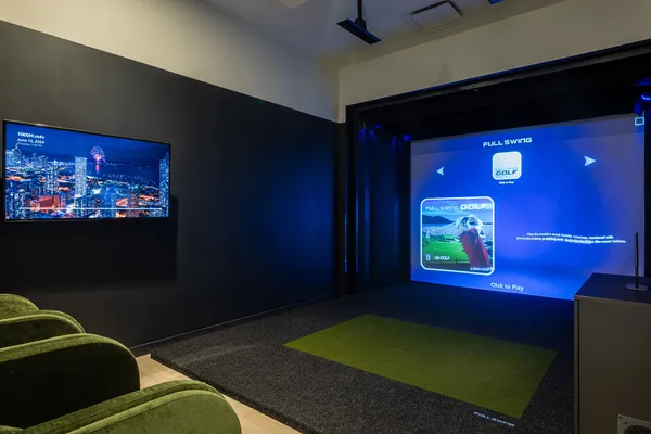 a view of an empty room with a tv
