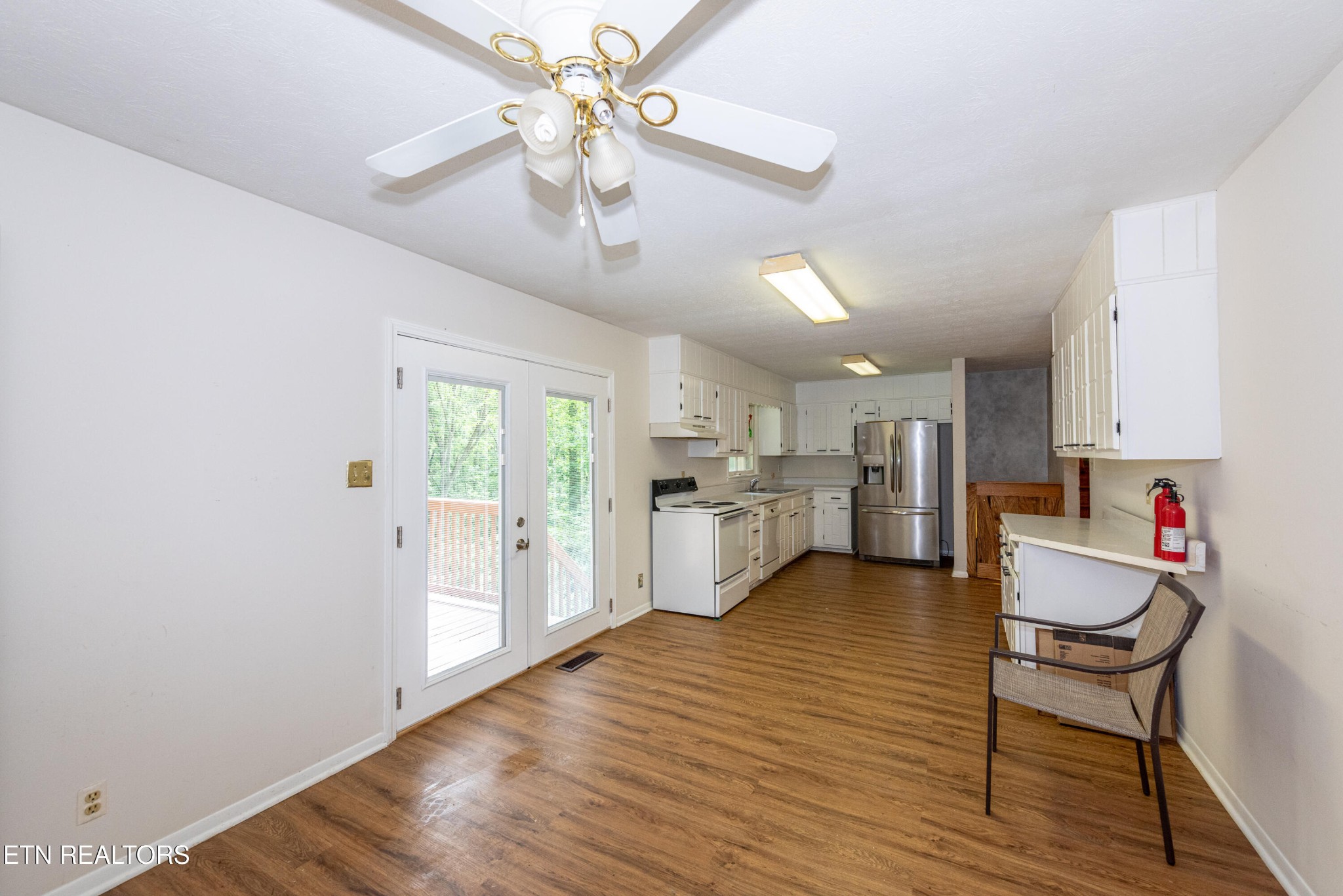133 Windham Road Oak Ridge, TN 37830 - Photo 13 of 35 a view of kitchen with furniture wooden floor and window