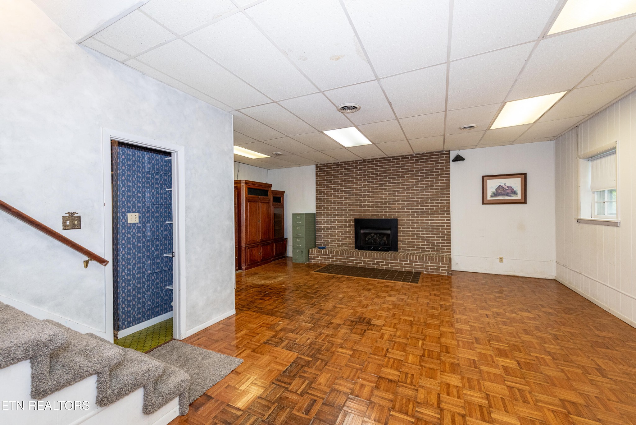 133 Windham Road Oak Ridge, TN 37830 - Photo 26 of 35 a view of an empty room with a fireplace