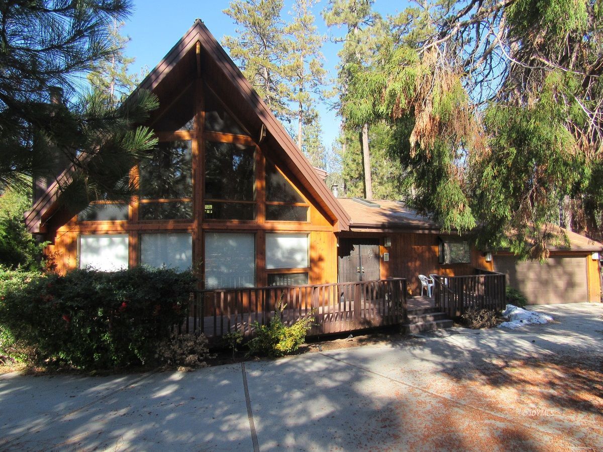 53700 Tollgate Road Idyllwild, CA 92549 - Photo 2 of 15 a view of a house with a tree in the background