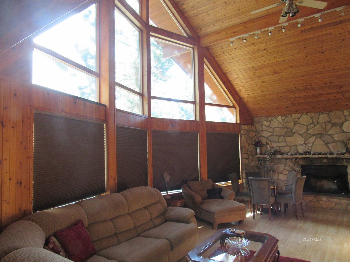 53700 Tollgate Road Idyllwild, CA 92549 - Photo 4 of 15 a living room with furniture and a fireplace