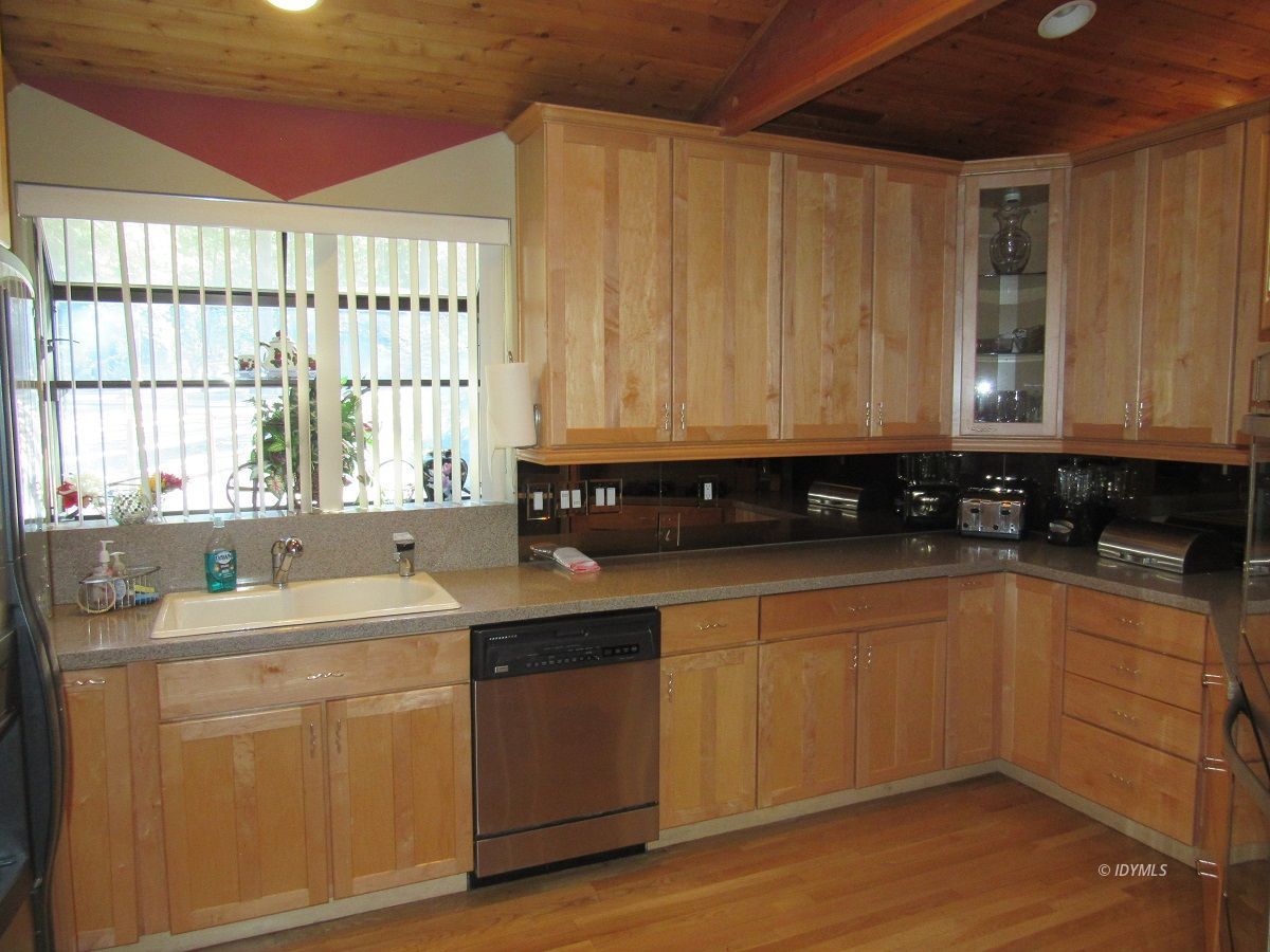 53700 Tollgate Road Idyllwild, CA 92549 - Photo 6 of 15 a view of a kitchen with a sink a window and cabinets