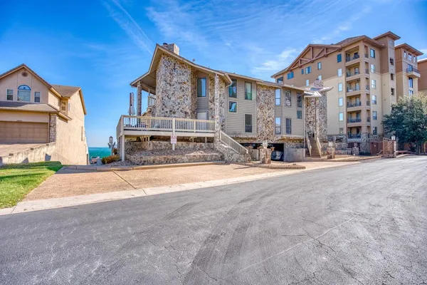 a building with trees in front of it