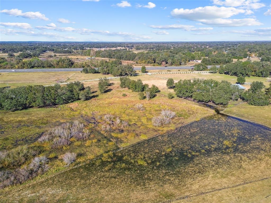 Southwest 32nd Bushnell, FL 33513 - Photo 14 of 35 a view of a lake with mountains in the background