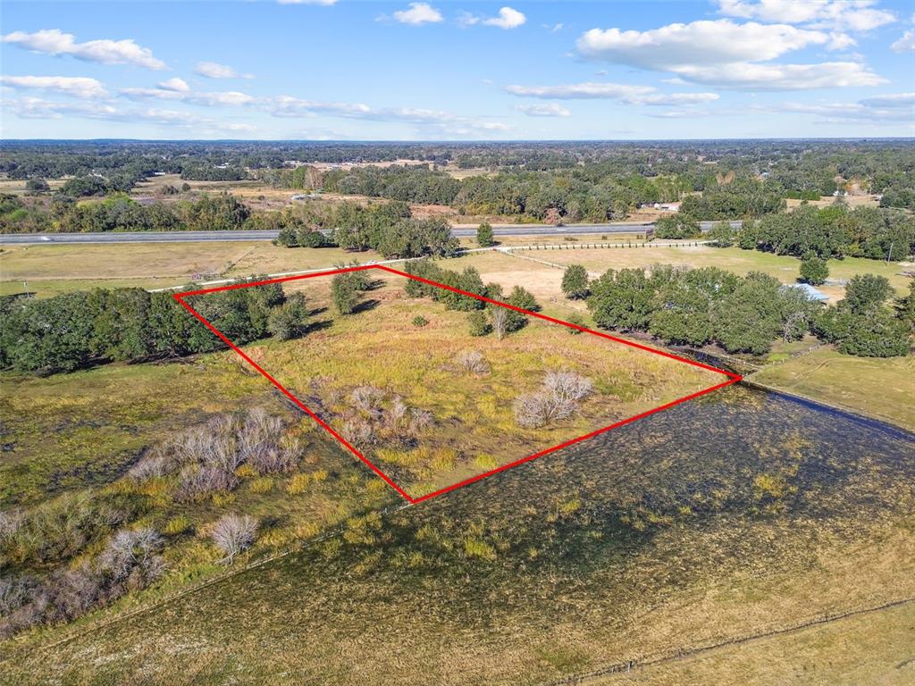 Southwest 32nd Bushnell, FL 33513 - Photo 15 of 35 a view of a lake with a mountain