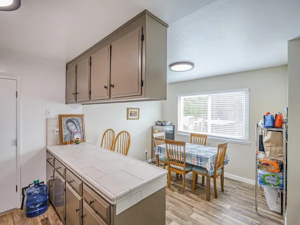 a bedroom with a bed and a couch