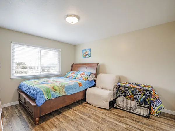 a bedroom with a bed and a closet