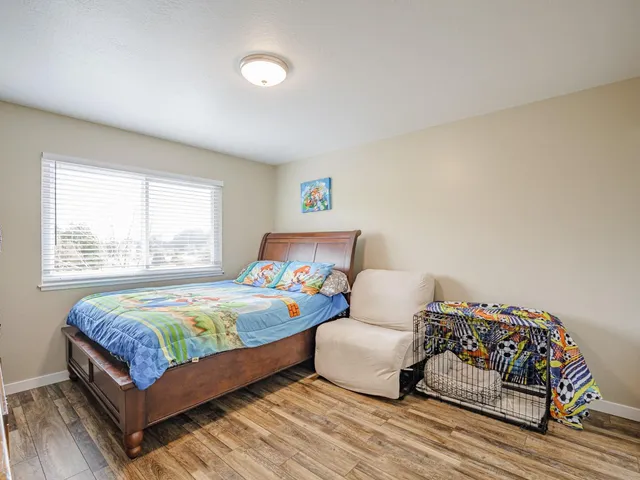 a bedroom with a bed and a closet