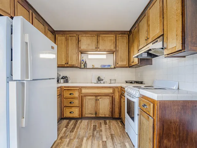 a living room with furniture and window