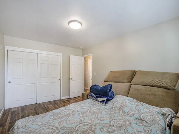 a view of a garden with a building in the background