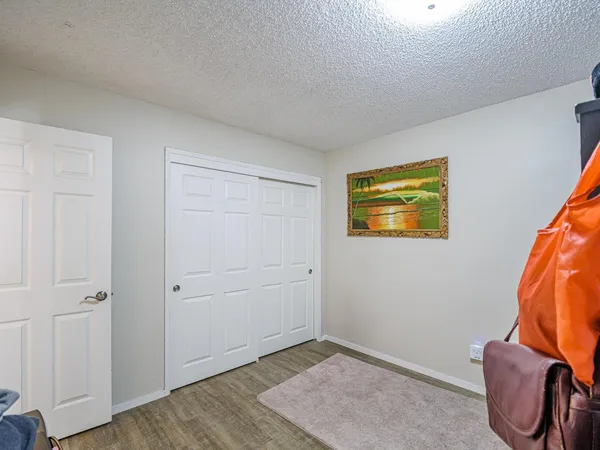 a reading room with furniture and book shelf