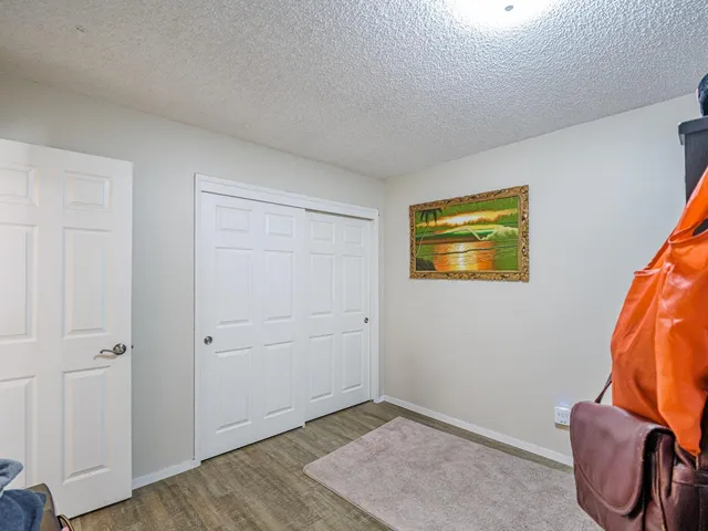 a reading room with furniture and book shelf