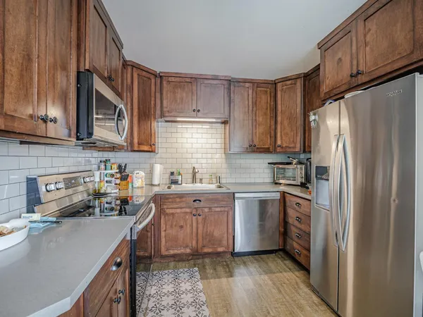 a view of a livingroom with furniture and window