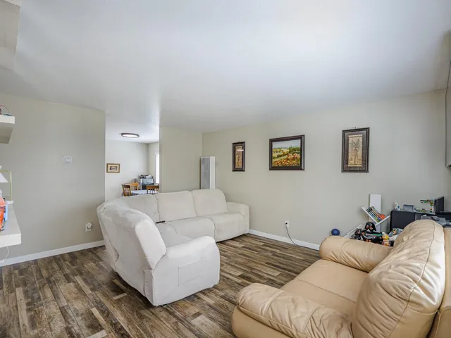 a kitchen with stainless steel appliances a stove a refrigerator a sink a stove and a refrigerator