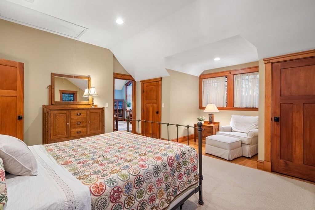 43 Boxford Road Ipswich, MA 01938 - Photo 20 of 37 a bedroom with a large bed and a dresser