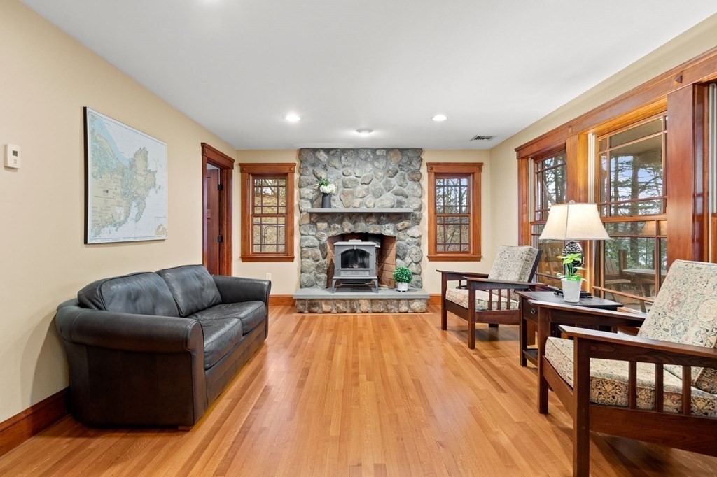43 Boxford Road Ipswich, MA 01938 - Photo 10 of 37 a living room with furniture and a fireplace