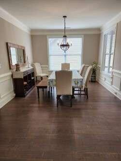 194 Yorkshire Lane Villa Rica, GA 30180 - Photo 13 of 20 a view of a dining room with furniture window and wooden floor