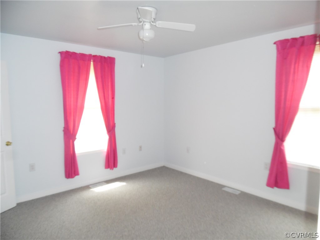 11500 Reedy Branch Road Chesterfield, VA 23838 - Photo 20 of 25 a room with red walls and a window