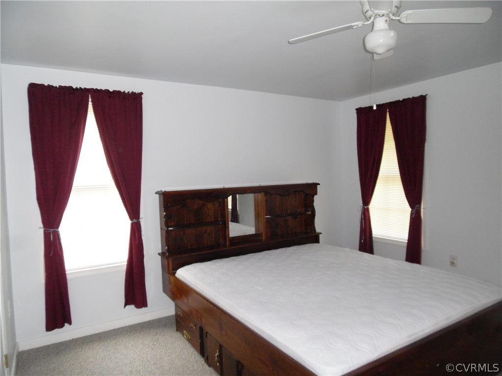 11500 Reedy Branch Road Chesterfield, VA 23838 - Photo 21 of 25 a bedroom with a bed and a window