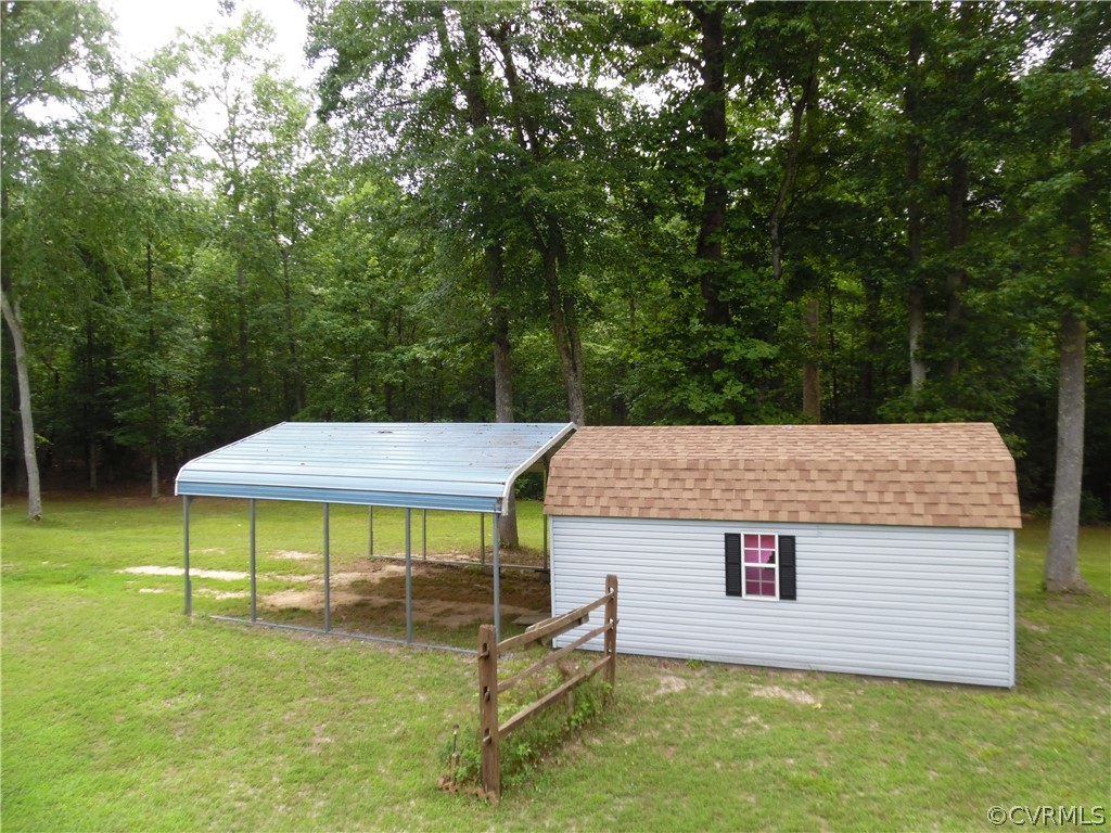 11500 Reedy Branch Road Chesterfield, VA 23838 - Photo 8 of 25 a view of a house with a sink and a yard