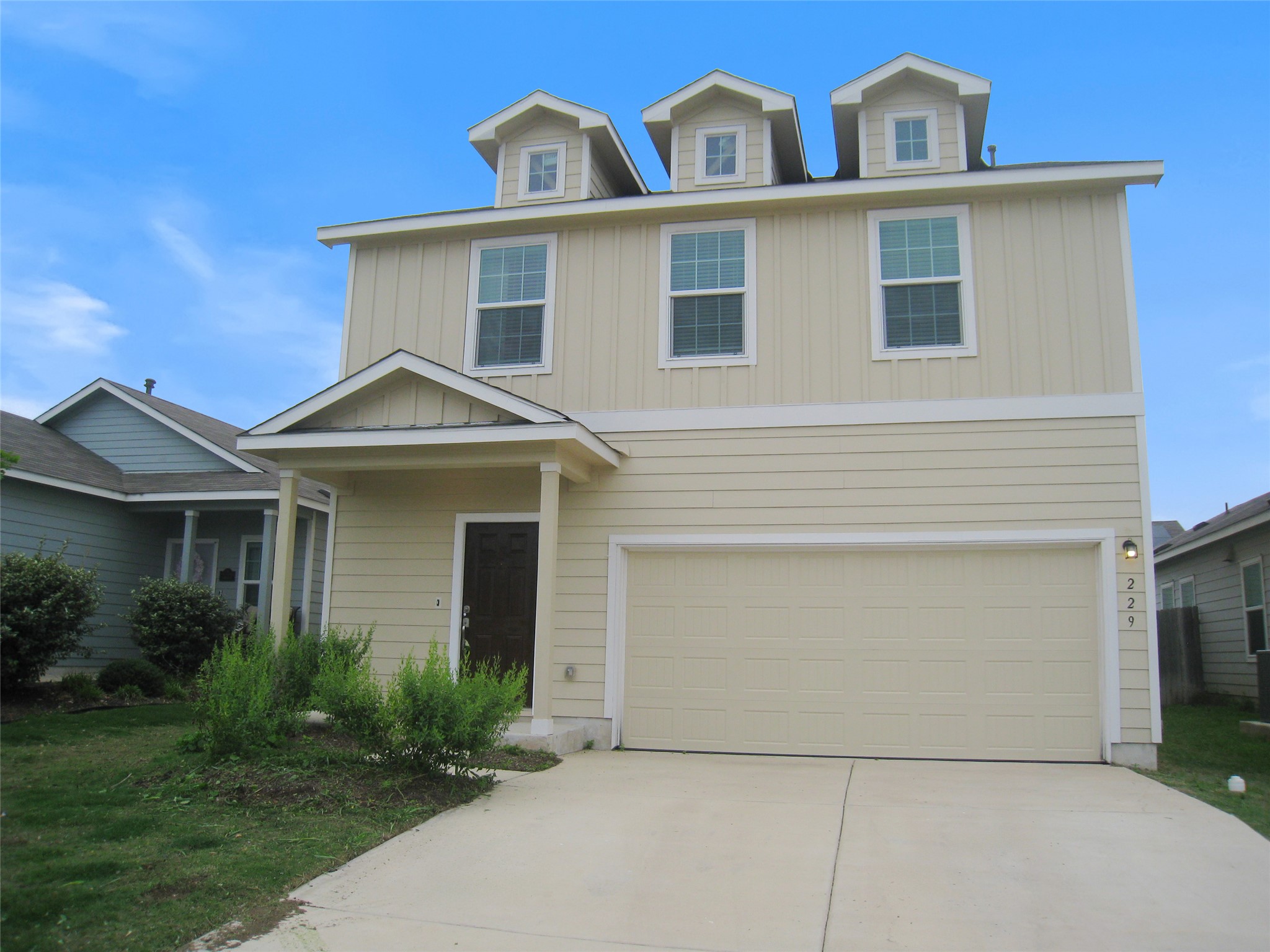 229 Geode Glen Maxwell, TX 78656 - Photo 1 of 19 A charming two-story home with a clean facade and inviting entryway.