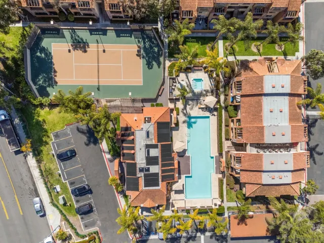 aerial view of residential houses with outdoor space