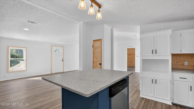 a bathroom with 2 sink and a mirror