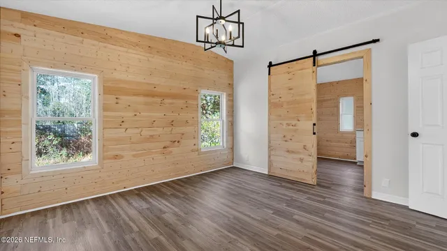 a bathroom with a sink a mirror and a bathtub