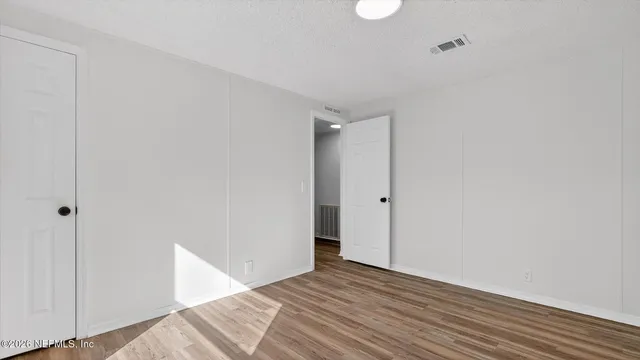 a view of water with a pathway