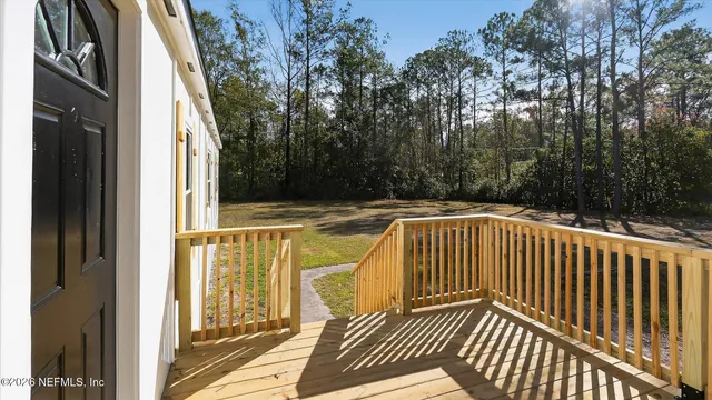 a view of a door and wooden door