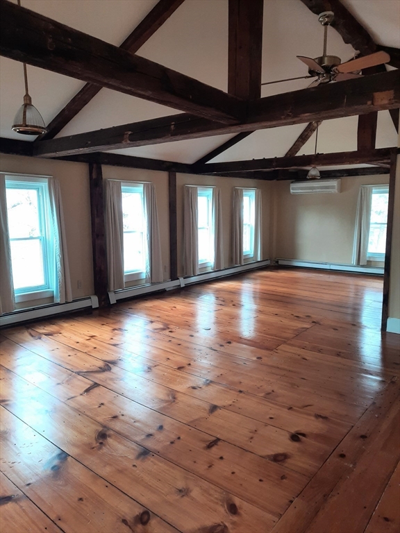 58 Main Street, Unit 2 Marshfield, MA 02050 - Photo 5 of 13 a view of a room with wooden floors