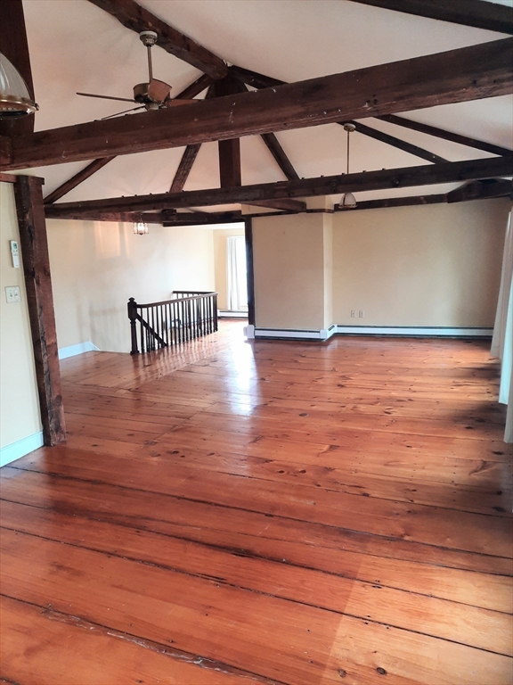 58 Main Street, Unit 2 Marshfield, MA 02050 - Photo 6 of 13 a view of entryway and hall with wooden floor