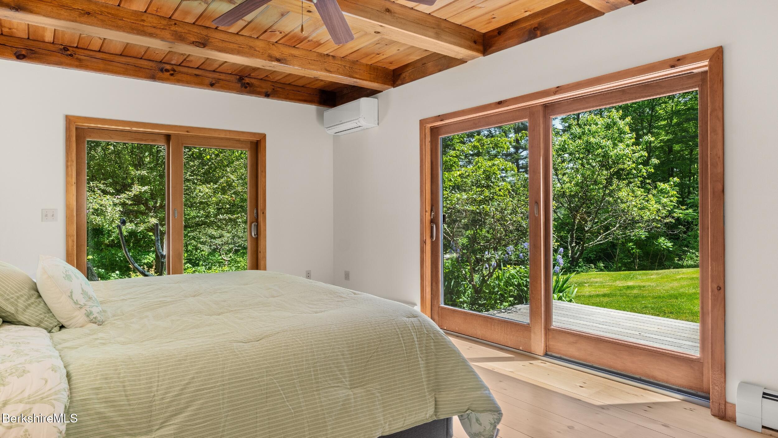 173 Hillsdale Road Egremont, MA 01230 - Photo 50 of 82 a bed sitting in a bedroom next to a window