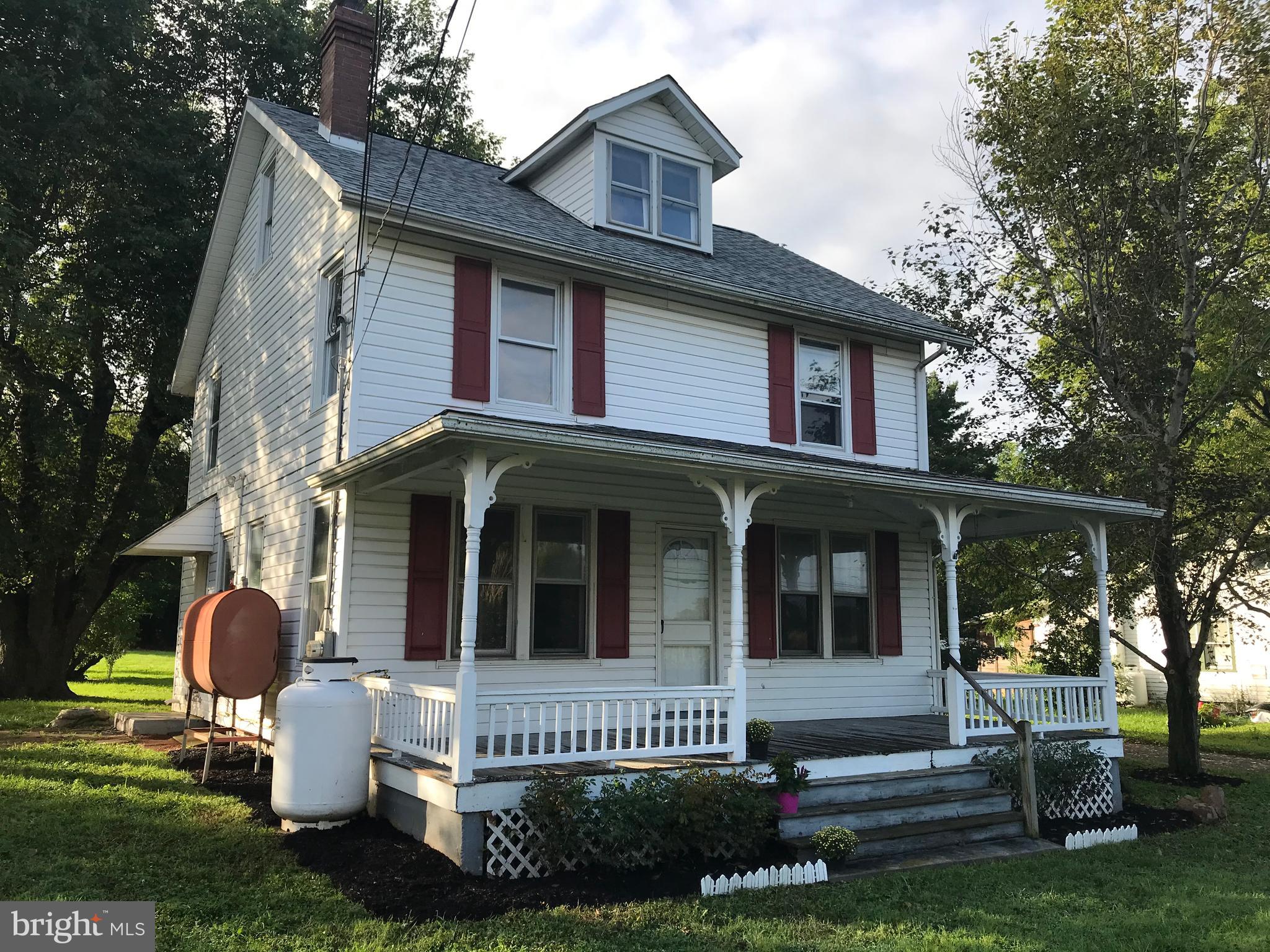 2033 Hopewell Road Oxford, PA 19363 - Photo 1 of 19 a view of house with a yard and a garden