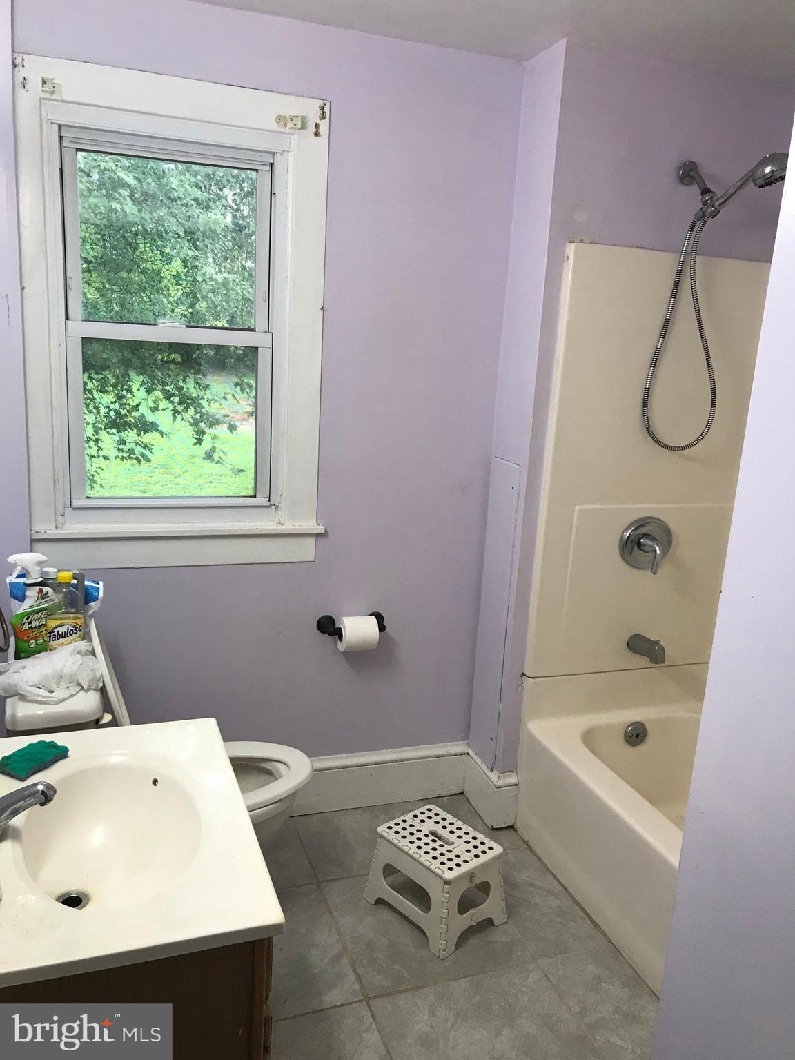 2033 Hopewell Road Oxford, PA 19363 - Photo 15 of 19 a bathroom with a sink a toilet and shower