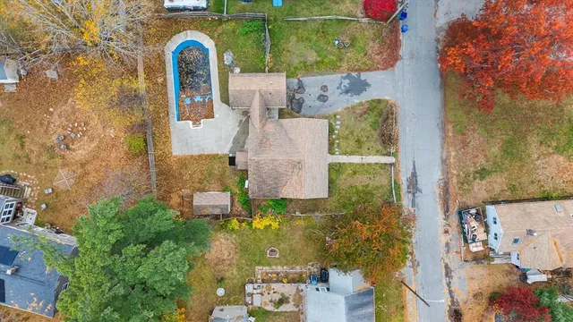 an aerial view of houses with outdoor space
