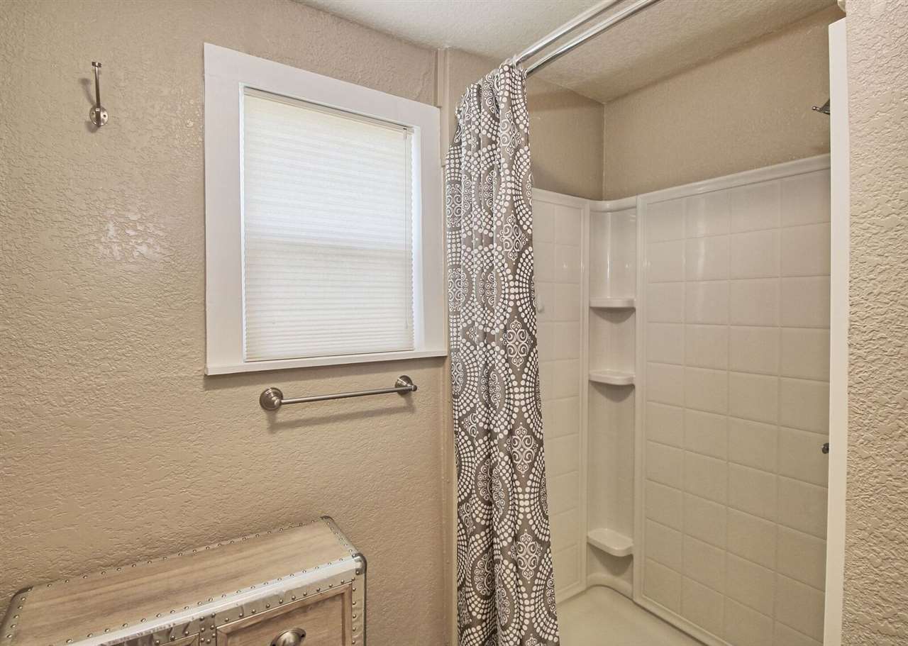 1302-17 17 1/2 Road Fruita, CO 81521 - Photo 24 of 39 a bathroom with a shower and a toilet