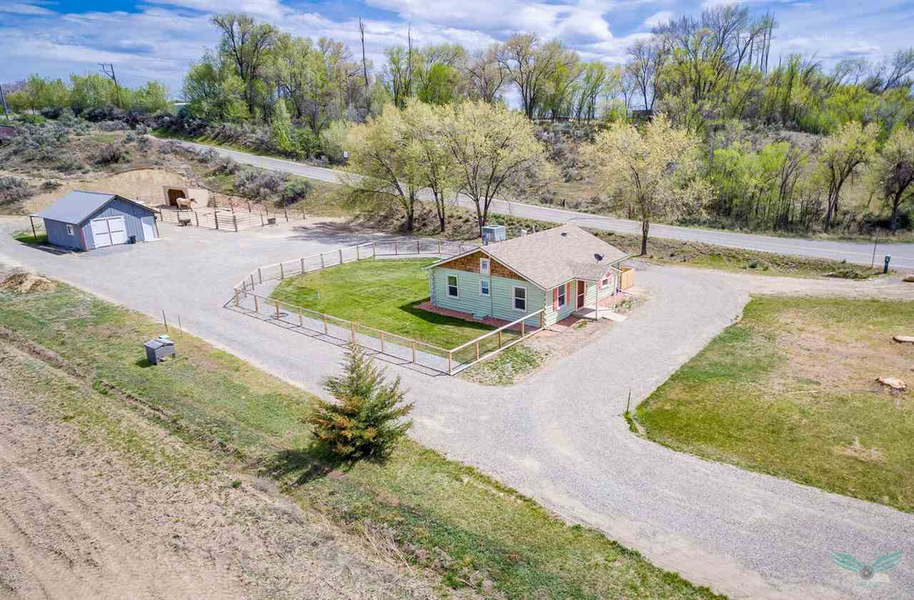 1302-17 17 1/2 Road Fruita, CO 81521 - Photo 36 of 39 an aerial view of a swimming pool with a yard