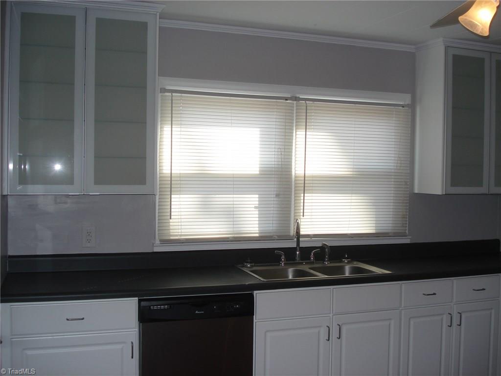 2721 Allen Jay Road High Point, NC 27263 - Photo 3 of 15 Kitchen has been updated and includes dishwasher.