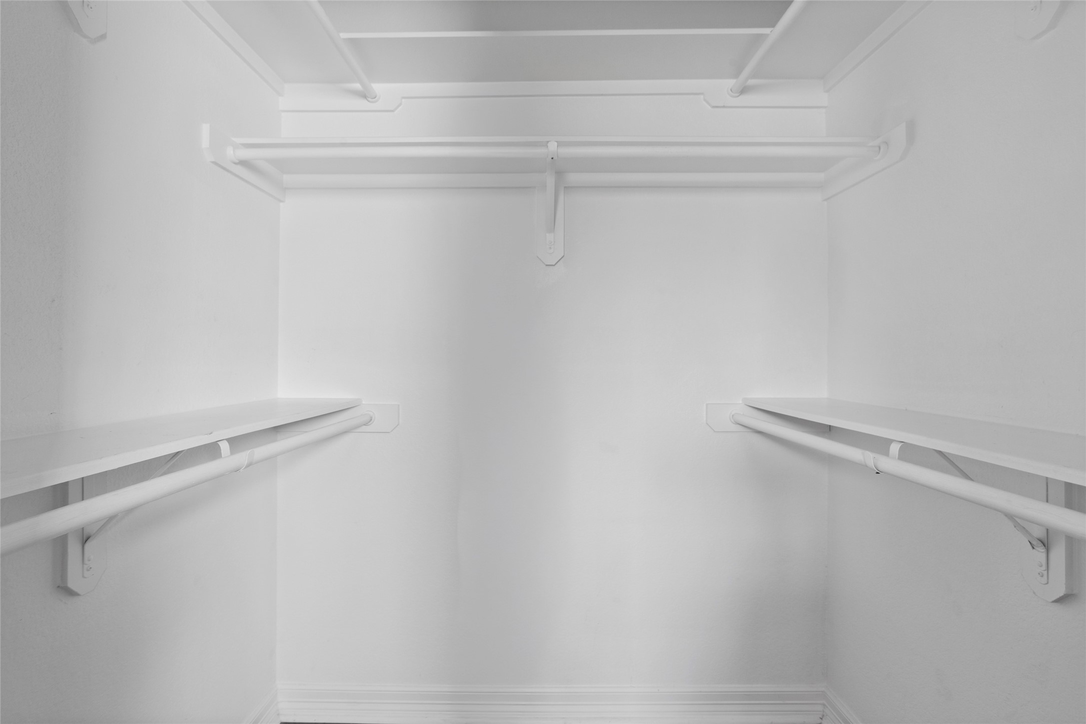 9814 Masterson Street Houston, TX 77029 - Photo 12 of 21 a view of a room with racks on the wall