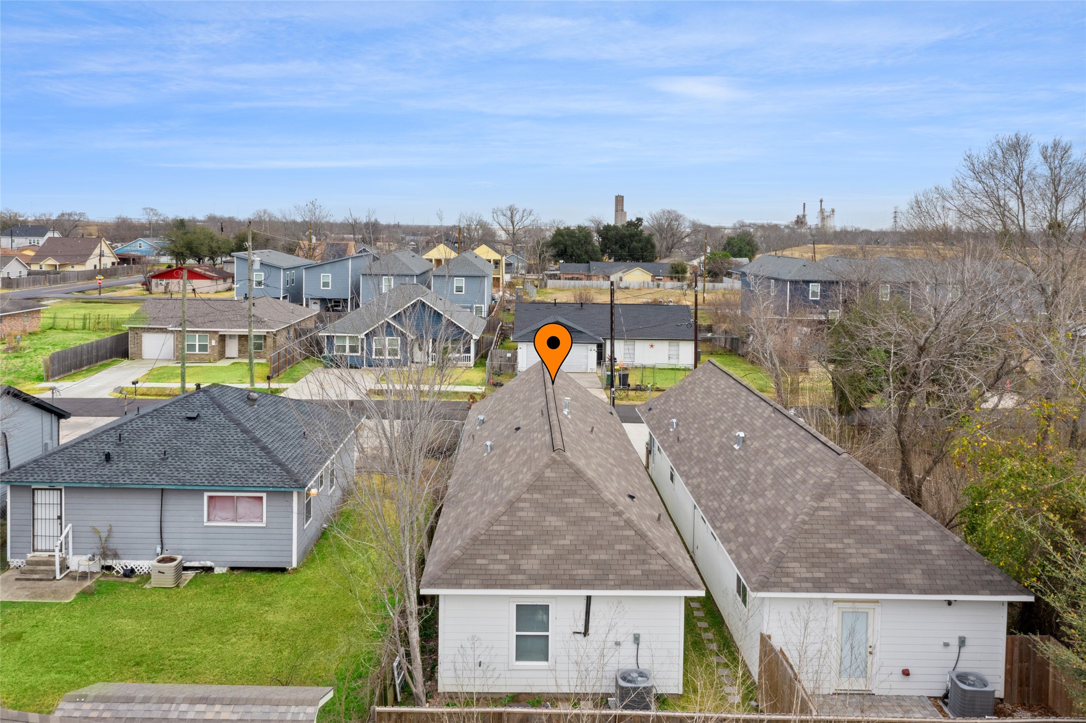 9814 Masterson Street Houston, TX 77029 - Photo 19 of 21 a view of residential houses with outdoor space and trees
