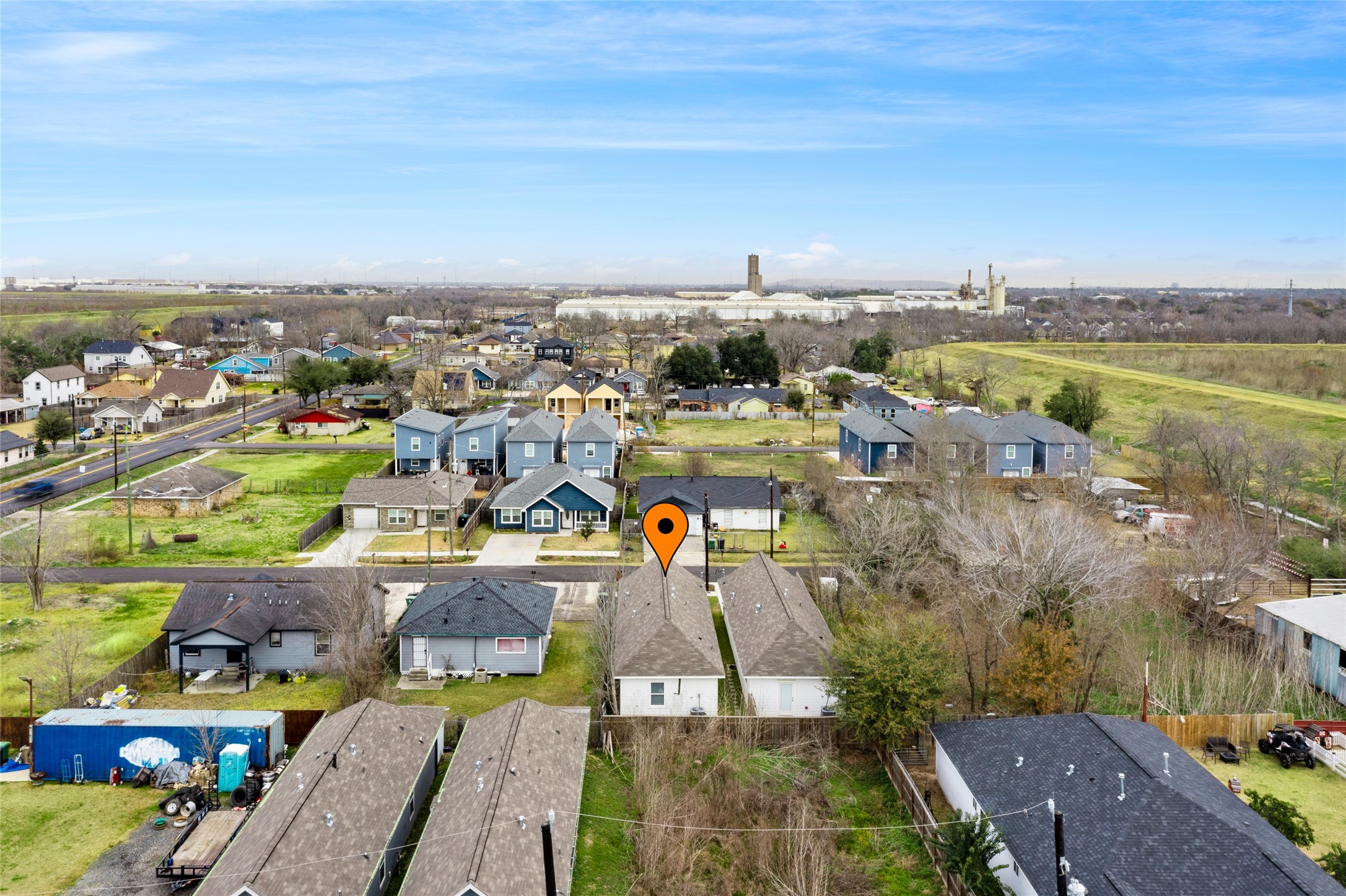 9814 Masterson Street Houston, TX 77029 - Photo 20 of 21 an aerial view of a city with lots of residential buildings and ocean view in back