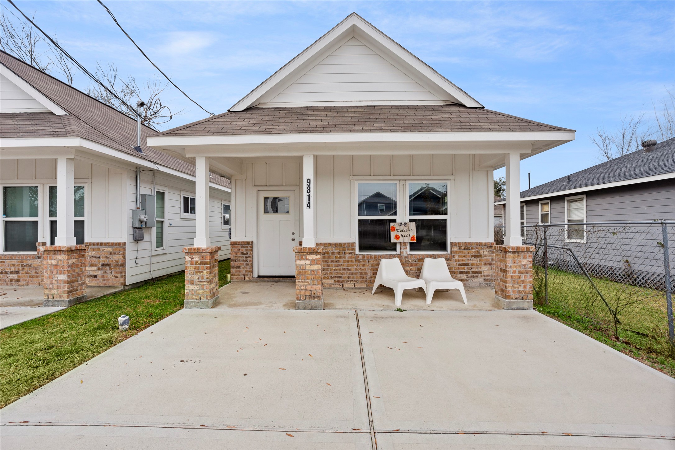 9814 Masterson Street Houston, TX 77029 - Photo 2 of 21 a view of a patio with table and chairs potted plants with wooden fence