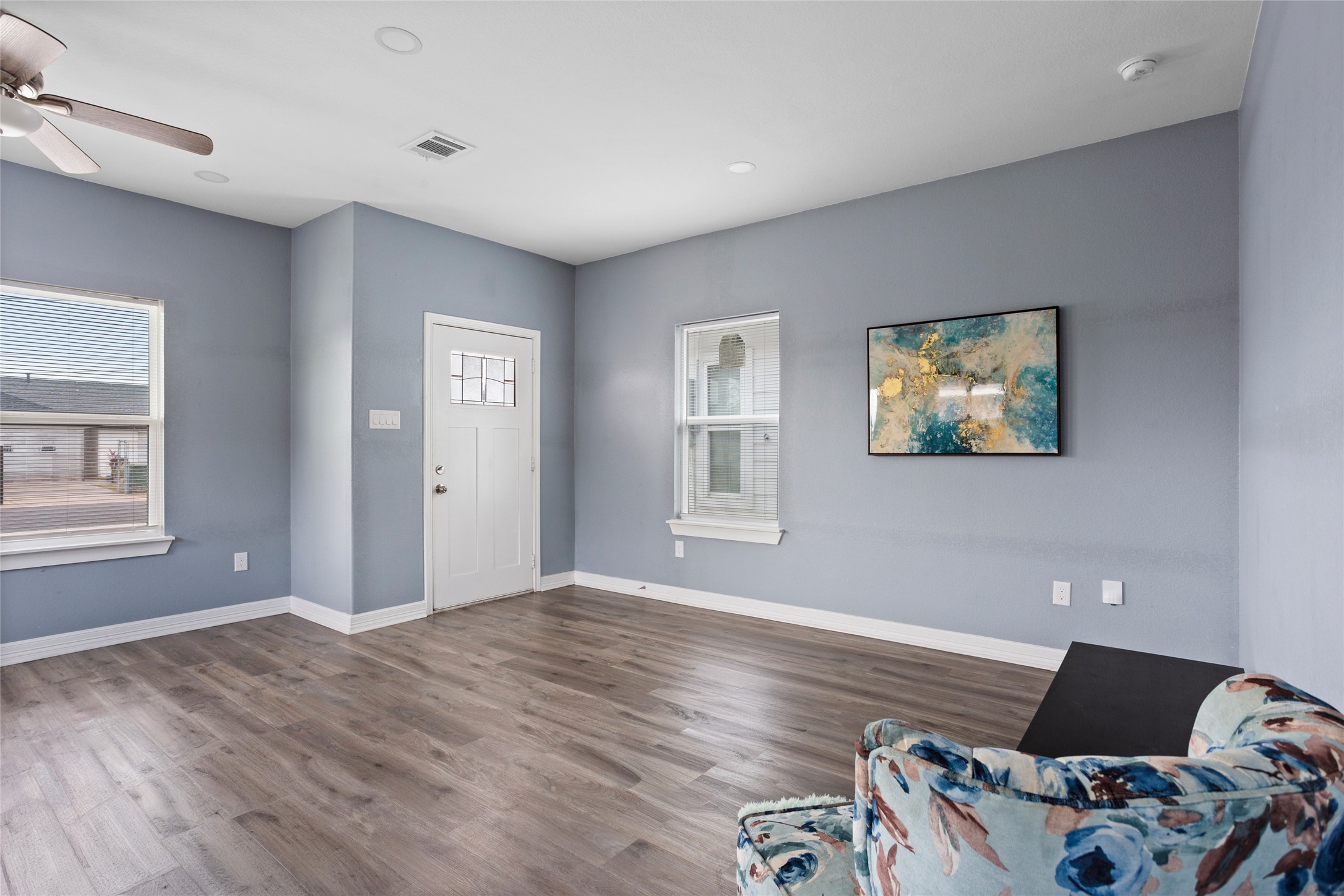 9814 Masterson Street Houston, TX 77029 - Photo 6 of 21 a view of a workspace with furniture and a window