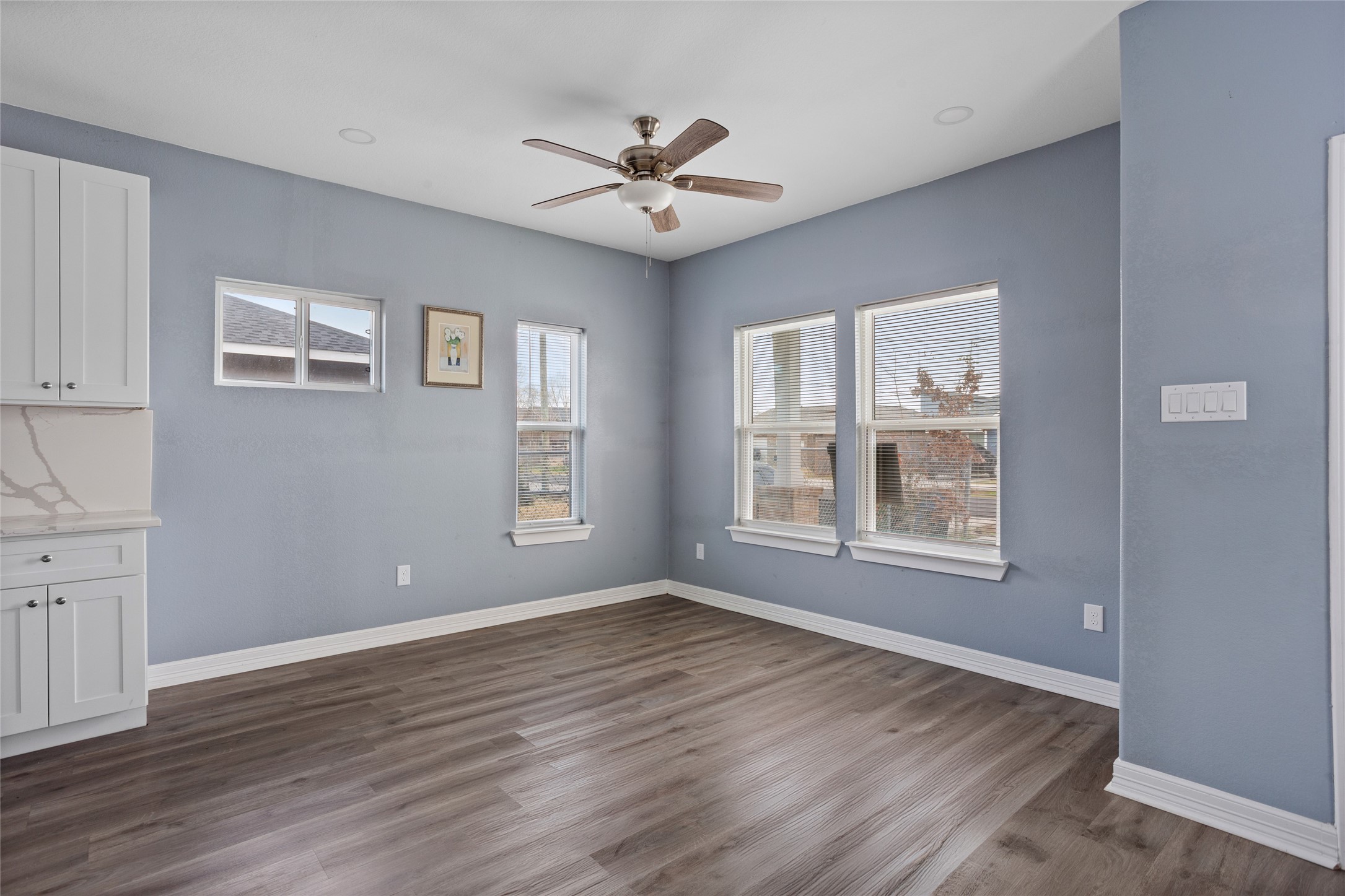 9814 Masterson Street Houston, TX 77029 - Photo 7 of 21 wooden floor in an empty room with a window