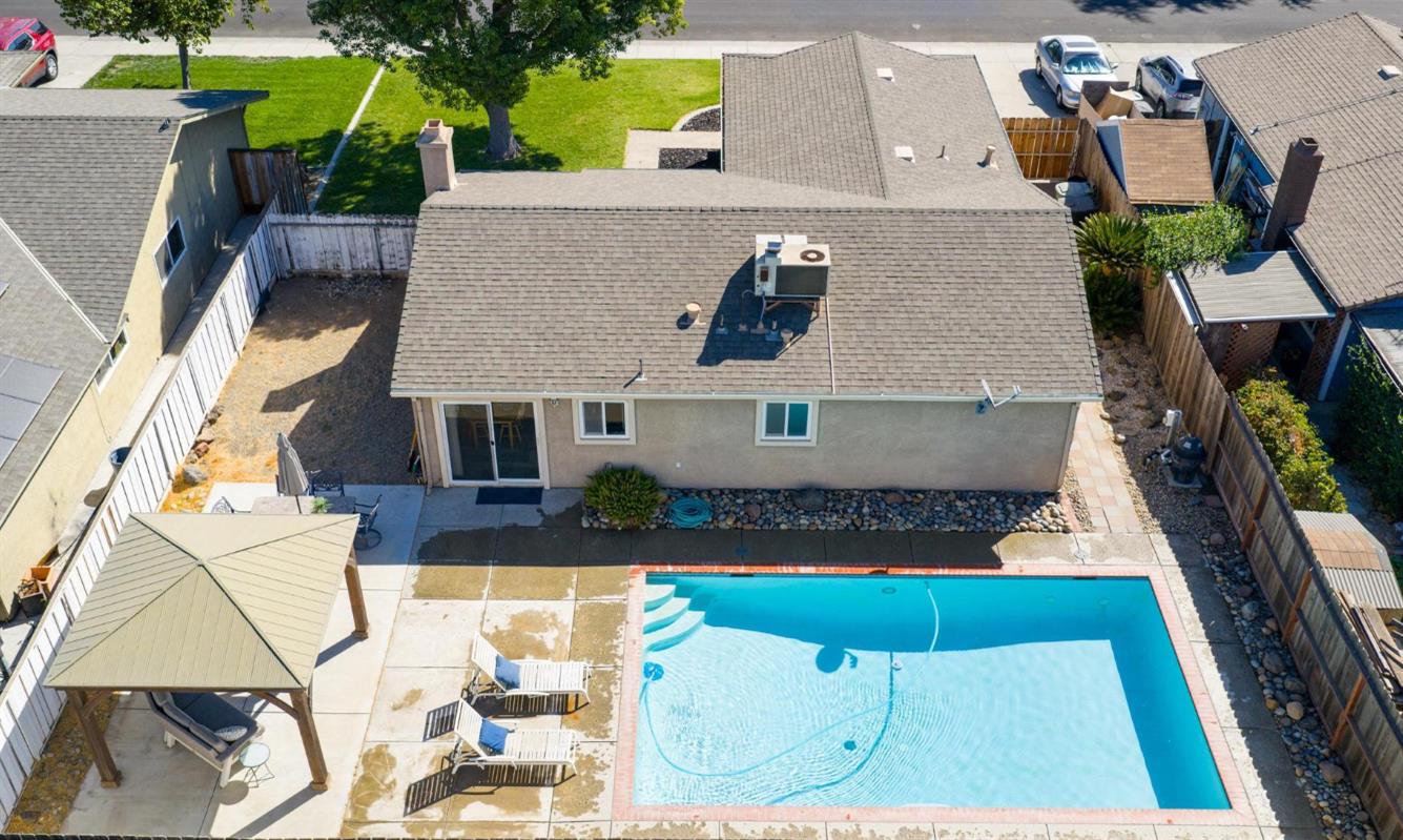 731 Dixie Lane Ripon, CA 95366 - Photo 14 of 22 an aerial view of a house with swimming pool