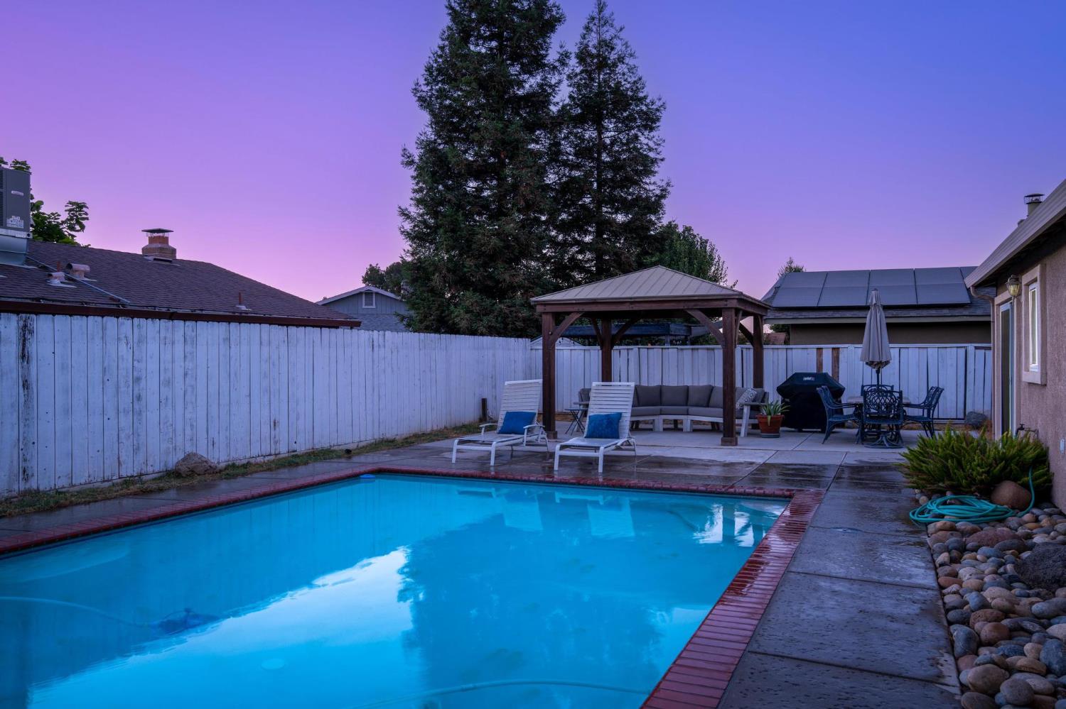 731 Dixie Lane Ripon, CA 95366 - Photo 15 of 22 a backyard of a house with table and chairs