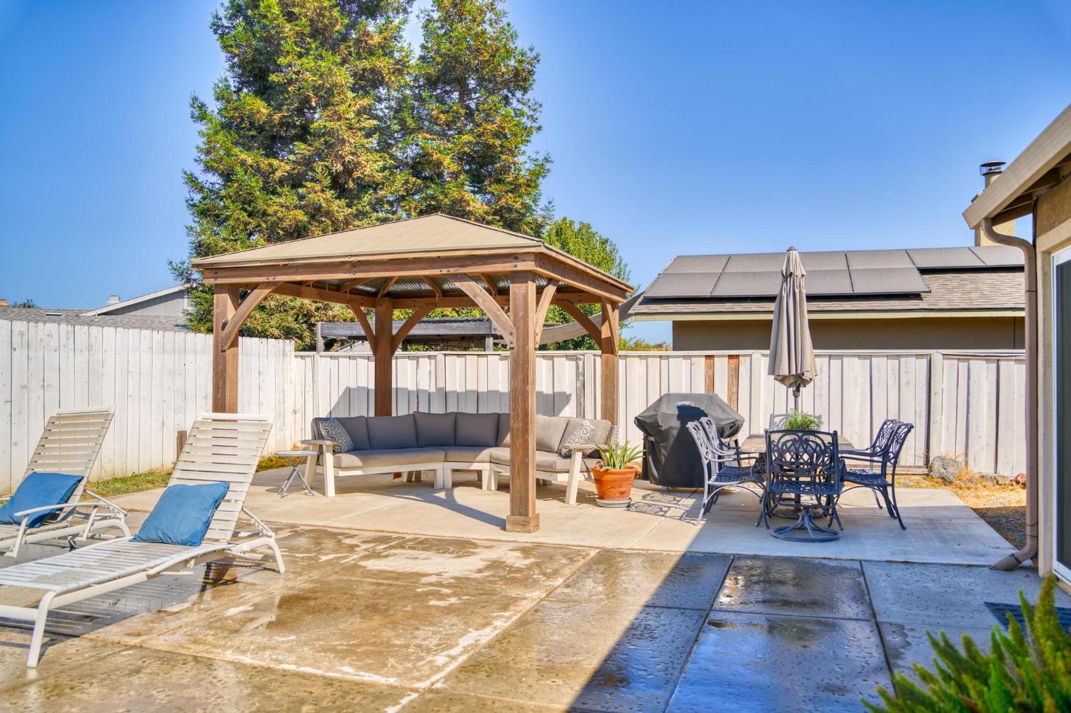 731 Dixie Lane Ripon, CA 95366 - Photo 21 of 22 a view of outdoor space yard deck patio and outdoor kitchen